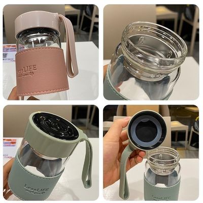 Botella de agua de vidrio de borosilicato personalizada de 480 ml con manga de cuero e infusor de té