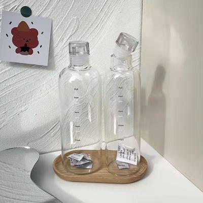 Estilo de diseño minimalista Botella de agua de vidrio de borosilicato libre de BPA de 500 ml con marcador de tiempo